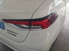 Toyota Corolla 2021 Hybrid 1.8L E-CVT Elite - ფოტო 8