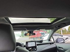 Toyota Corolla Hybrid 1.8H E-CVT Luxury - ფოტო 18