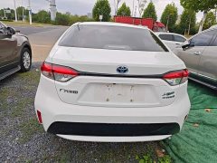 Toyota Corolla Hybrid 1.8H E-CVT Luxury - ფოტო 6
