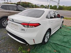 Toyota Corolla Hybrid 1.8H E-CVT Luxury - ფოტო 7