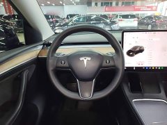 Tesla Model Y Standard Range RWD - ფოტო 11