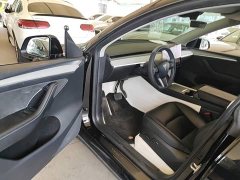 Tesla Model Y Rear-Wheel Drive - ფოტო 16