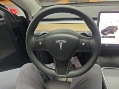 Tesla Model Y Standard Range RWD - ფოტო 11