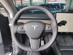 Tesla Model Y Standard Range RWD - ფოტო 11