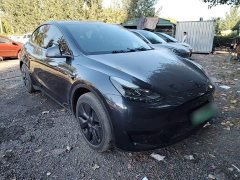 Tesla Model Y Rear-Wheel Drive - ფოტო 4