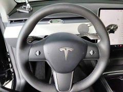 Tesla Model Y Standard Range RWD - ფოტო 11