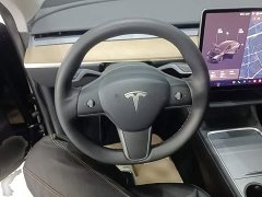 Tesla Model Y Standard Range RWD - ფოტო 11