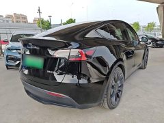 Tesla Model Y Performance All-Wheel Drive - ფოტო 7