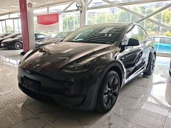 Tesla Model Y Rear-Wheel Drive - ფოტო 1