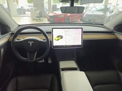 Tesla Model Y Standard Range RWD - ფოტო 10