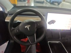Tesla Model Y Standard Range RWD - ფოტო 11