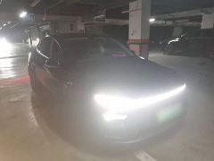 Tesla Model Y Rear-Wheel Drive - ფოტო 4