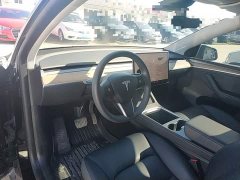 Tesla Model Y Standard Range RWD - ფოტო 10