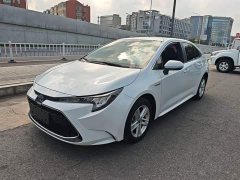 Toyota Corolla Hybrid 1.8H E-CVT Luxury - ფოტო 1