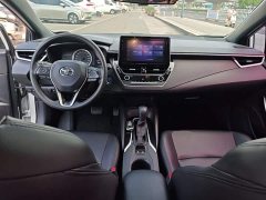Toyota Corolla Hybrid 1.8H E-CVT Luxury - ფოტო 10