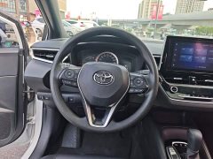 Toyota Corolla Hybrid 1.8H E-CVT Luxury - ფოტო 11