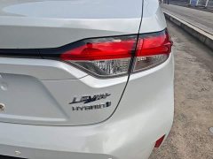 Toyota Corolla Hybrid 1.8H E-CVT Luxury - ფოტო 8