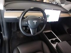 Tesla Model Y Standard Range RWD - ფოტო 10