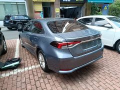 Toyota Corolla 2021 Hybrid 1.8L E-CVT Elite - ფოტო 5