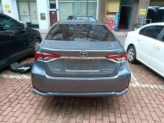 Toyota Corolla 2021 Hybrid 1.8L E-CVT Elite - ფოტო 6