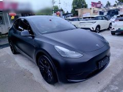 Tesla Model Y Rear-Wheel Drive - ფოტო 4