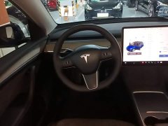 Tesla Model Y Standard Range RWD - ფოტო 11