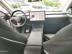 Tesla Model Y Standard Range RWD - ფოტო 10