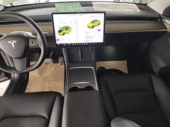 Tesla Model Y Standard Range RWD - ფოტო 13