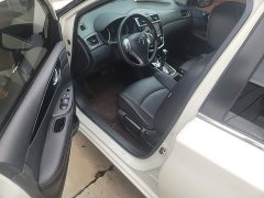 Nissan Qida Tiida 1.6L CVT Smart Edition - ფოტო 16