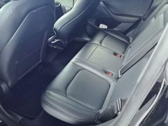 Tesla Model Y Rear-Wheel Drive - ფოტო 17