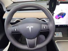 Tesla Model Y Standard Range RWD - ფოტო 11