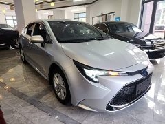 Toyota Corolla Hybrid 1.8H E-CVT Luxury - ფოტო 4