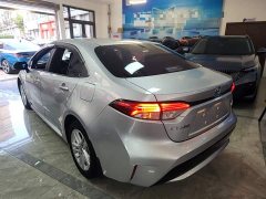 Toyota Corolla Hybrid 1.8H E-CVT Luxury - ფოტო 5