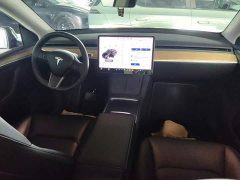 Tesla Model Y Standard Range RWD - ფოტო 10