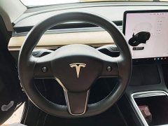 Tesla Model Y Standard Range RWD - ფოტო 11