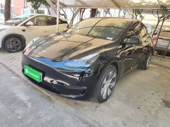 Tesla Model Y Standard Range RWD - ფოტო 1