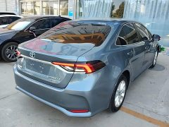 Toyota Corolla 2021 Hybrid 1.8L E-CVT Elite - ფოტო 7