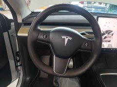 Tesla Model Y Performance All-Wheel Drive - ფოტო 11