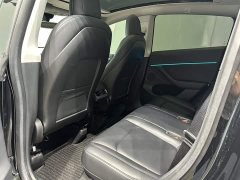 Tesla Model Y Rear-Wheel Drive - ფოტო 4