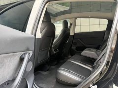 Tesla Model Y Rear-Wheel Drive - ფოტო 16