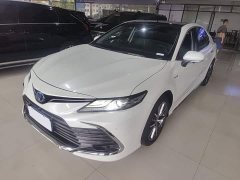 Toyota Camry 2023 Hybrid 2.5L HG Luxury - ფოტო 1