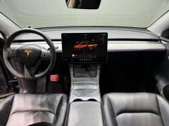 Tesla Model Y Rear-Wheel Drive - ფოტო 17