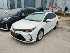 Toyota Corolla 2021 Hybrid 1.8L E-CVT Elite - ფოტო 1