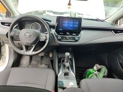 Toyota Corolla 2021 Hybrid 1.8L E-CVT Elite - ფოტო 6