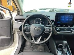 Toyota Corolla 2021 Hybrid 1.8L E-CVT Elite - ფოტო 7