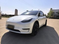 Tesla Model Y Rear-Wheel Drive - ფოტო 1