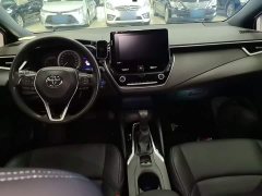 Toyota Corolla Hybrid 1.8H E-CVT Luxury - ფოტო 10