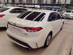 Toyota Corolla Hybrid 1.8H E-CVT Luxury - ფოტო 7