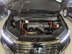 Honda Odyssey 2.0L e:HEV Luxury - ფოტო 10