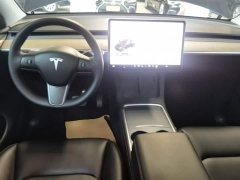 Tesla Model Y Standard Range RWD - ფოტო 10